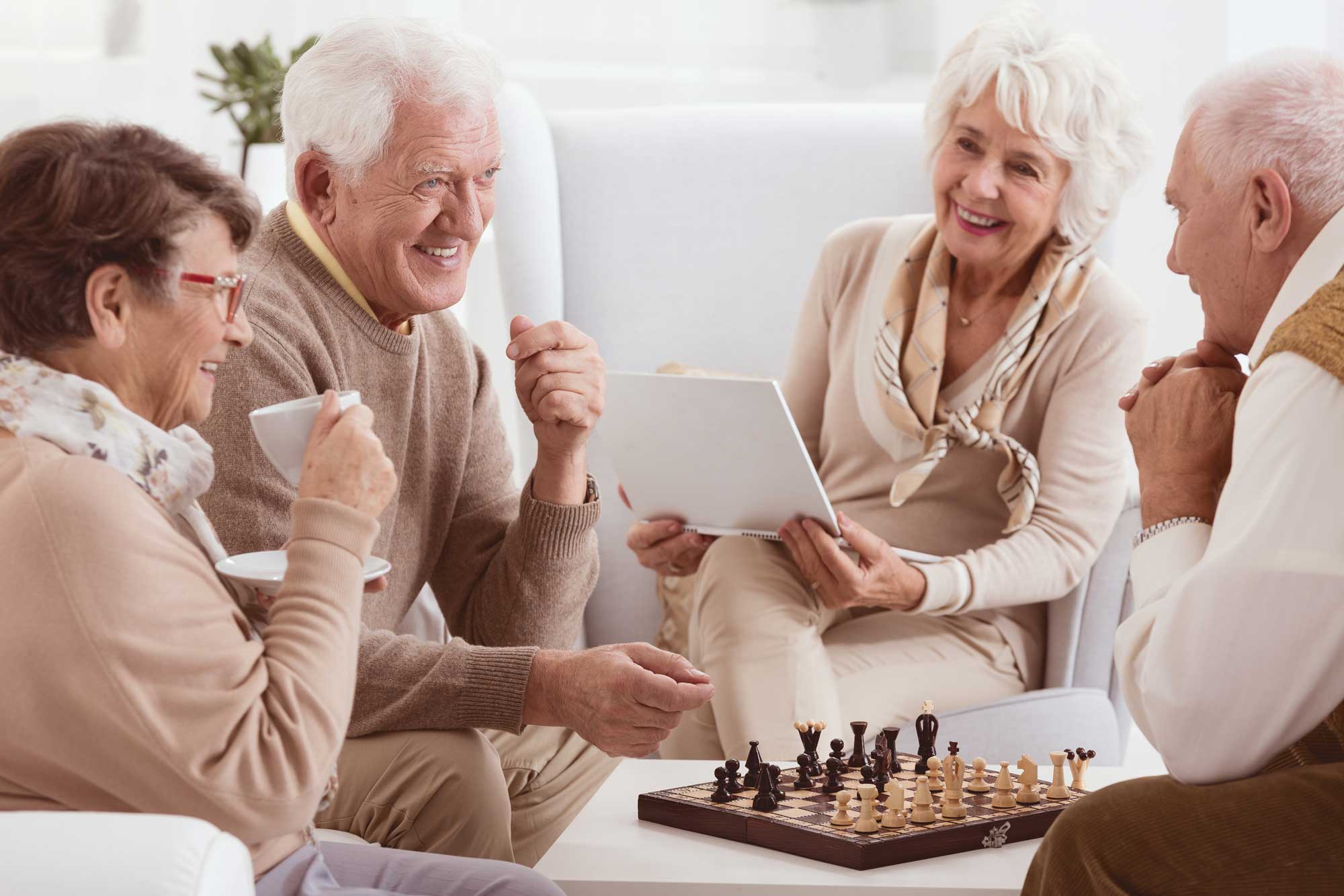 a group of seniors playing chess