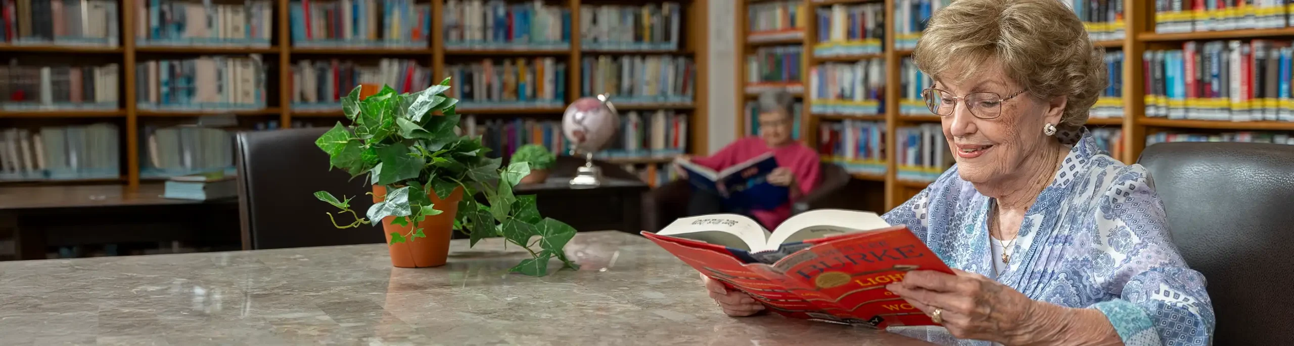 community gallery page image, woman reading a book